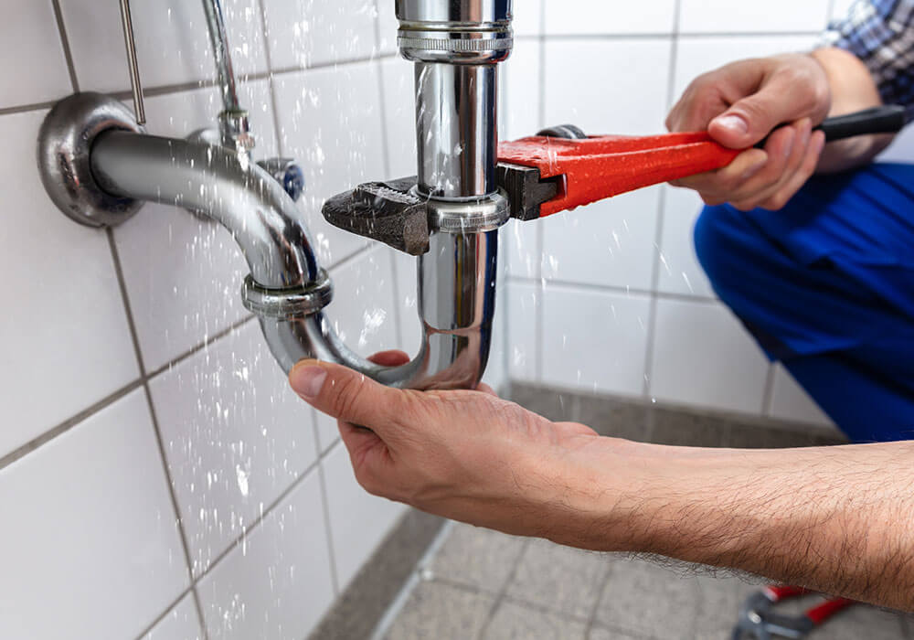 Superior Plumbing and Drains Plumber Fixing Leak