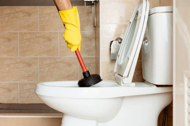 When Should You Call A Plumber For A Clogged Toilet?